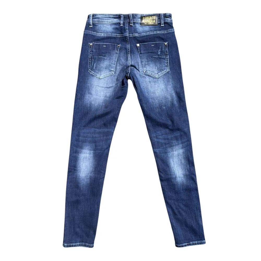 Patched Rip & Repair Denim Jeans – Roberto Raniera