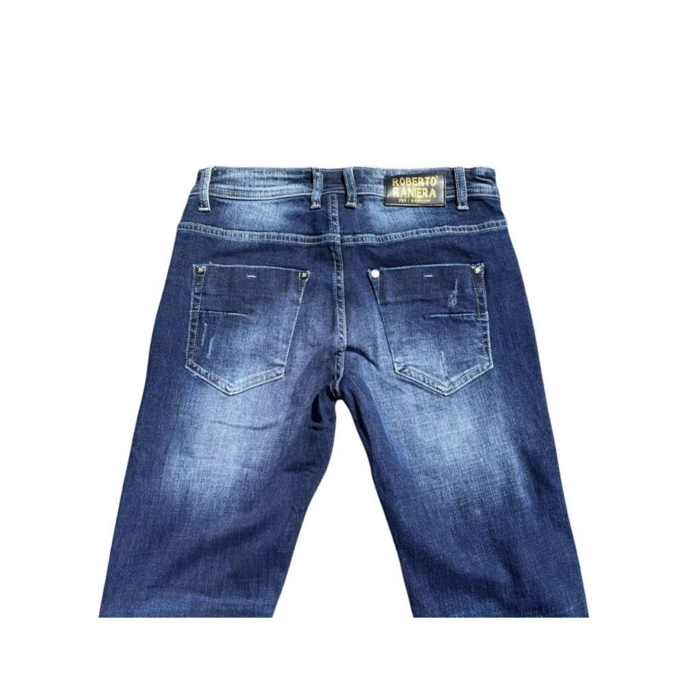 Patched Rip & Repair Denim Jeans – Roberto Raniera